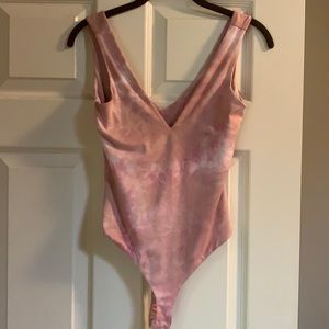 Pink body suit